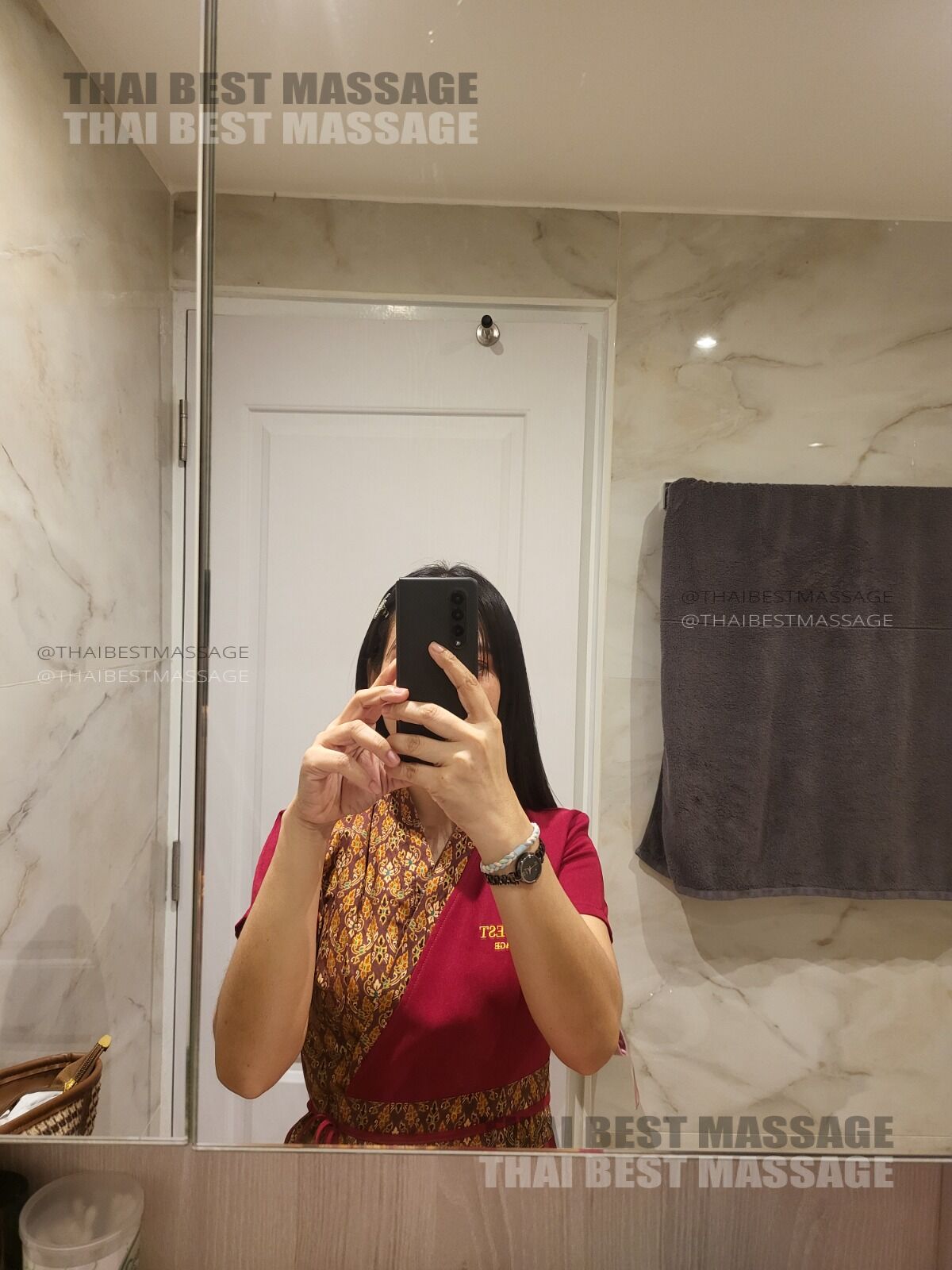 THAI BEST MASSAGE Therapist Preaw arriving for an outcall massage