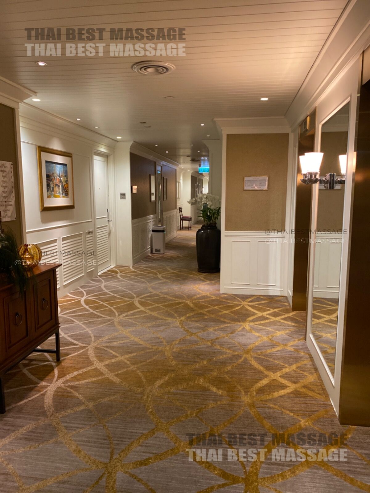 Professional outcall massage setup on a hotel bed