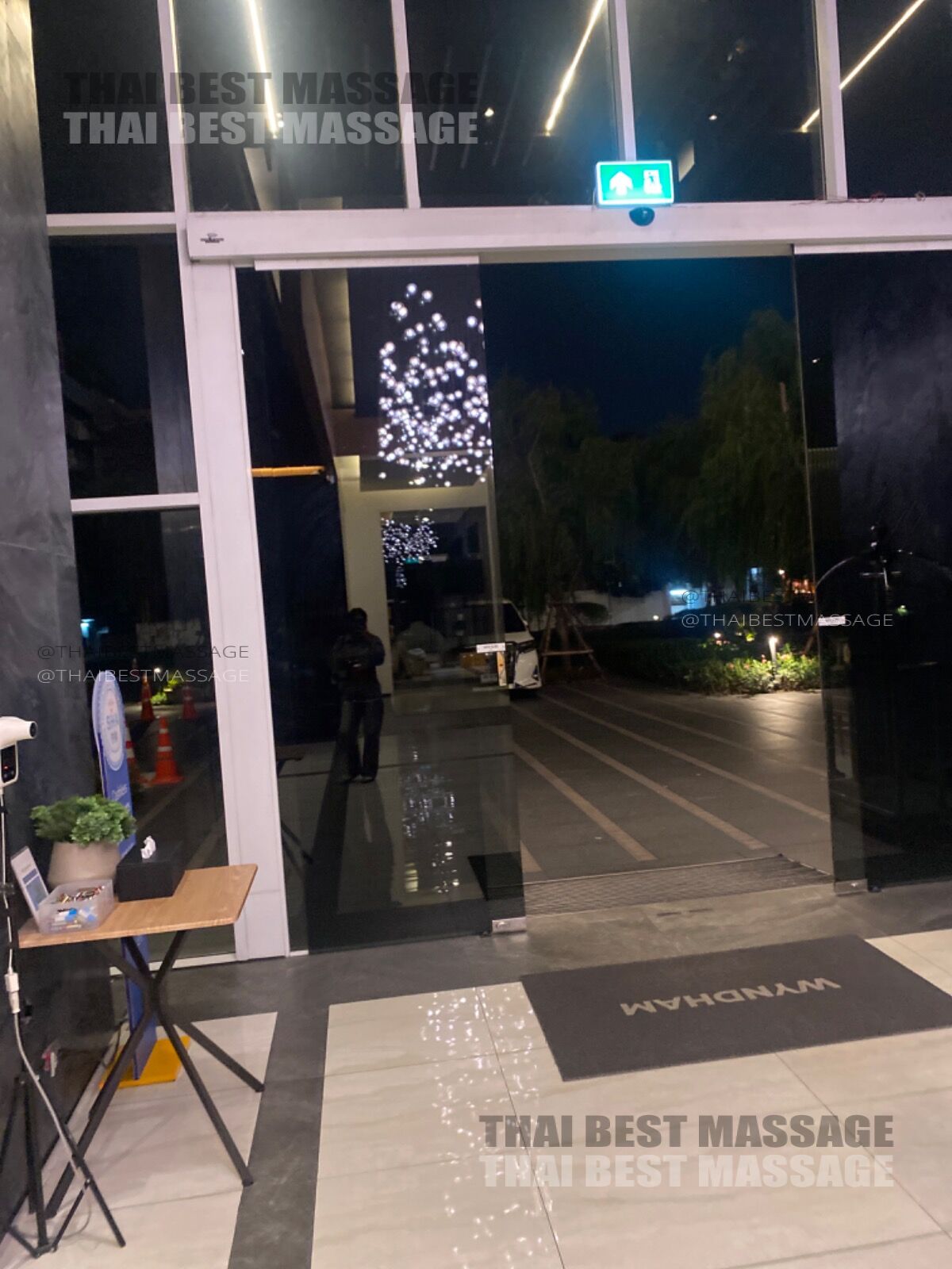 Close-up view of Thai massage focusing on the shoulder and back area