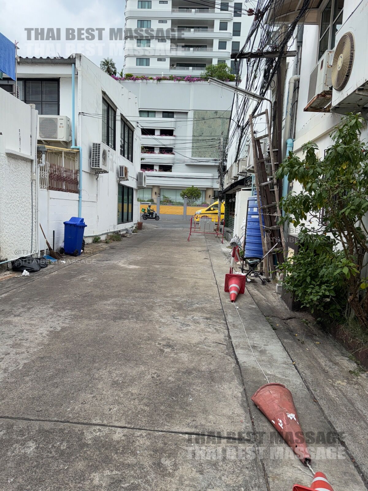 Close-up view of the therapist performing professional foot massage during an outcall service
