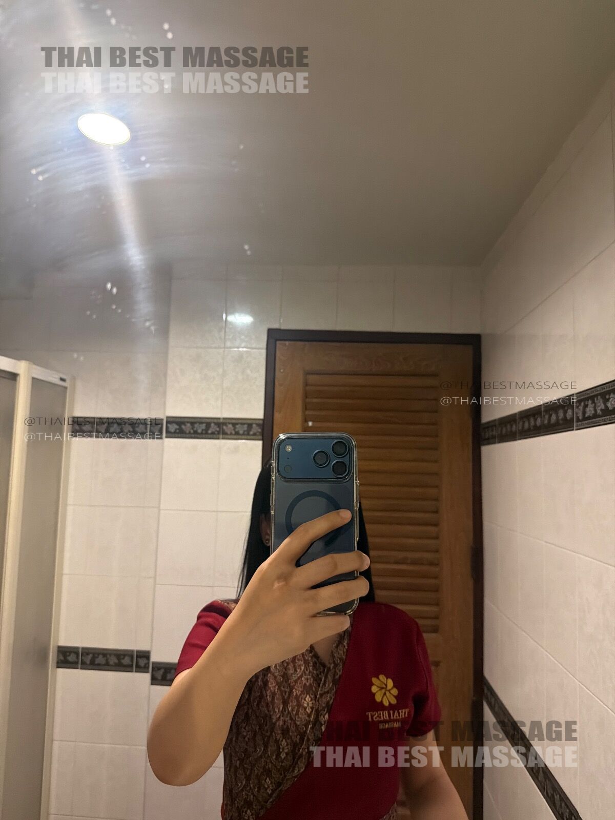 Therapist preparing for outcall massage session in Bangkok
